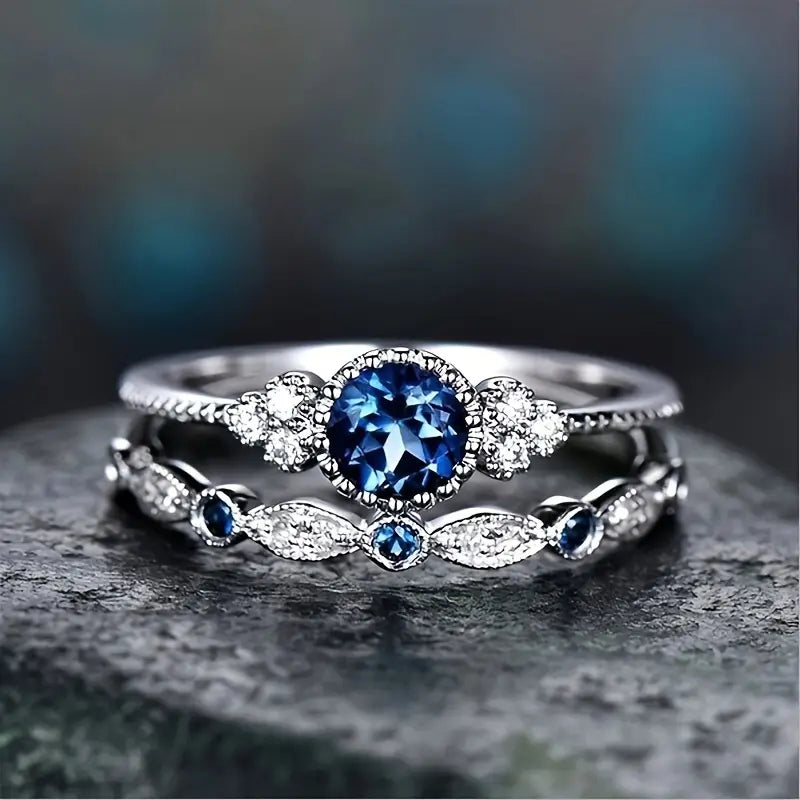 Silver sapphire halo ring