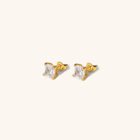 March solitaire gold earrings