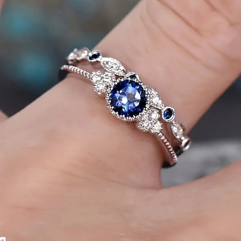 Silver sapphire halo ring