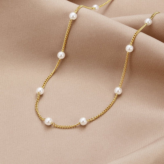 Timeless pearl gold necklace